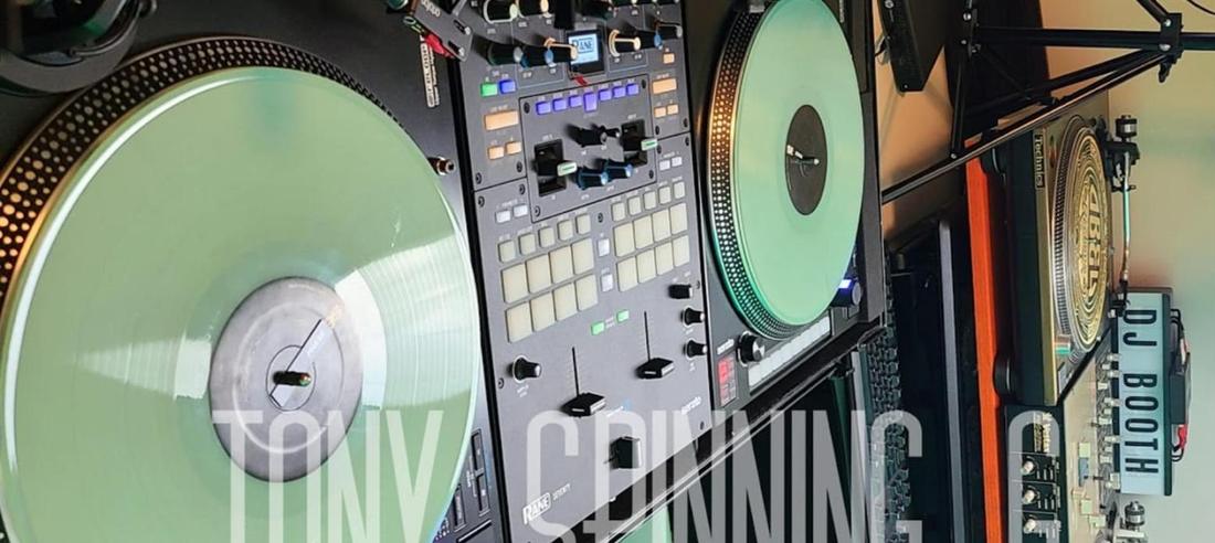 Turntables and mixer in the DJ booth